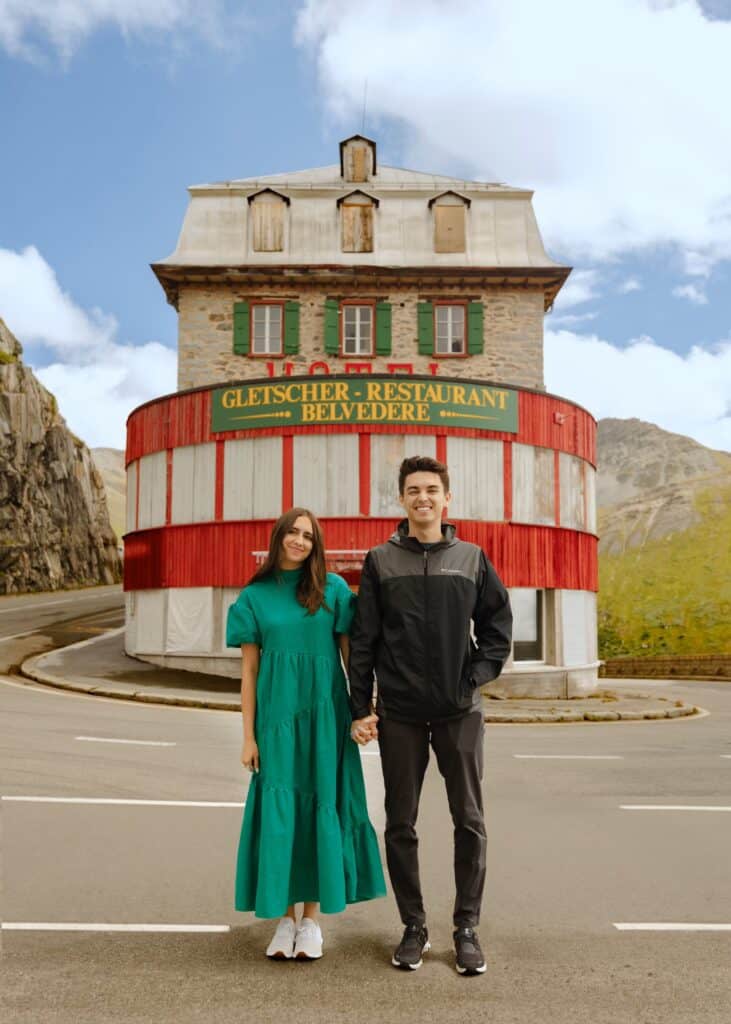 Utah Videography Couple in front of restaurant in Switzerland