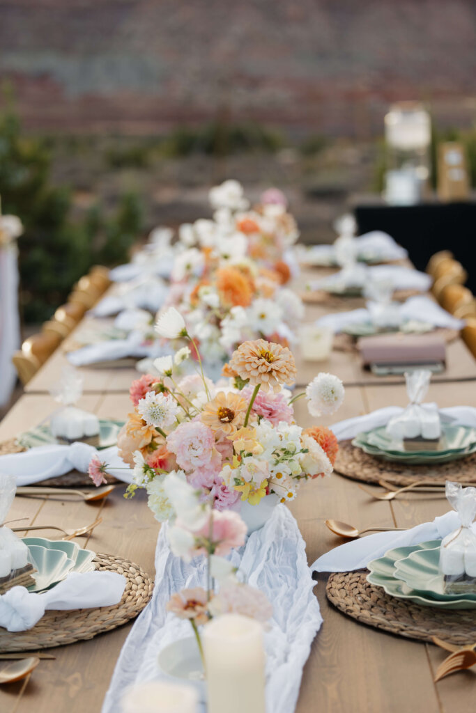 Floral centerpieces going down center of table